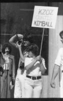 Buffoon, photog, flag girl