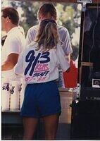 KCPR volunteer serving refreshments at an event]